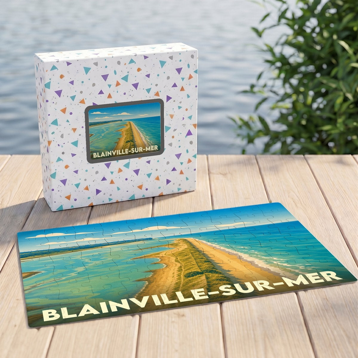 Puzzle souvenir de la ville de Blainville-sur-Mer avec une illustration stylisée d'un paysage côtier.