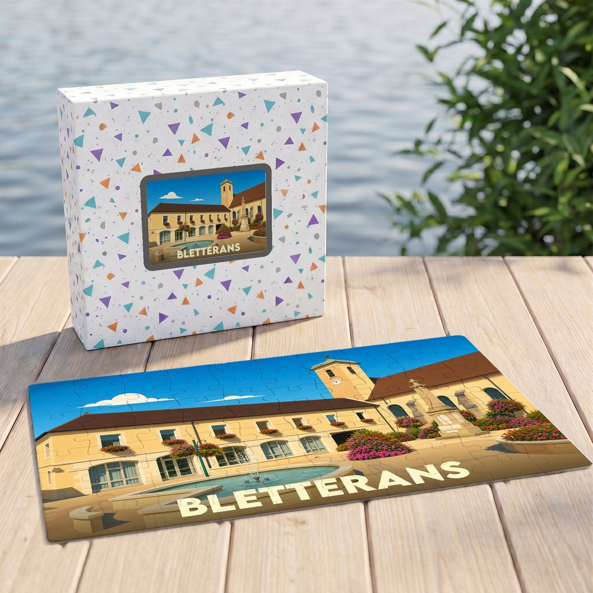 Puzzle souvenir de la ville de Bletterans avec une illustration stylisée d'une place arborée et fleurie.