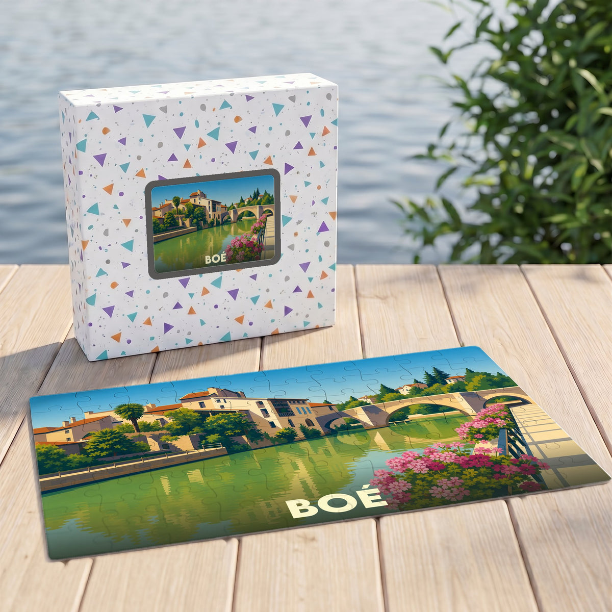 Puzzle souvenir de la ville de Boé avec une illustration stylisée d'un paysage fluvial.