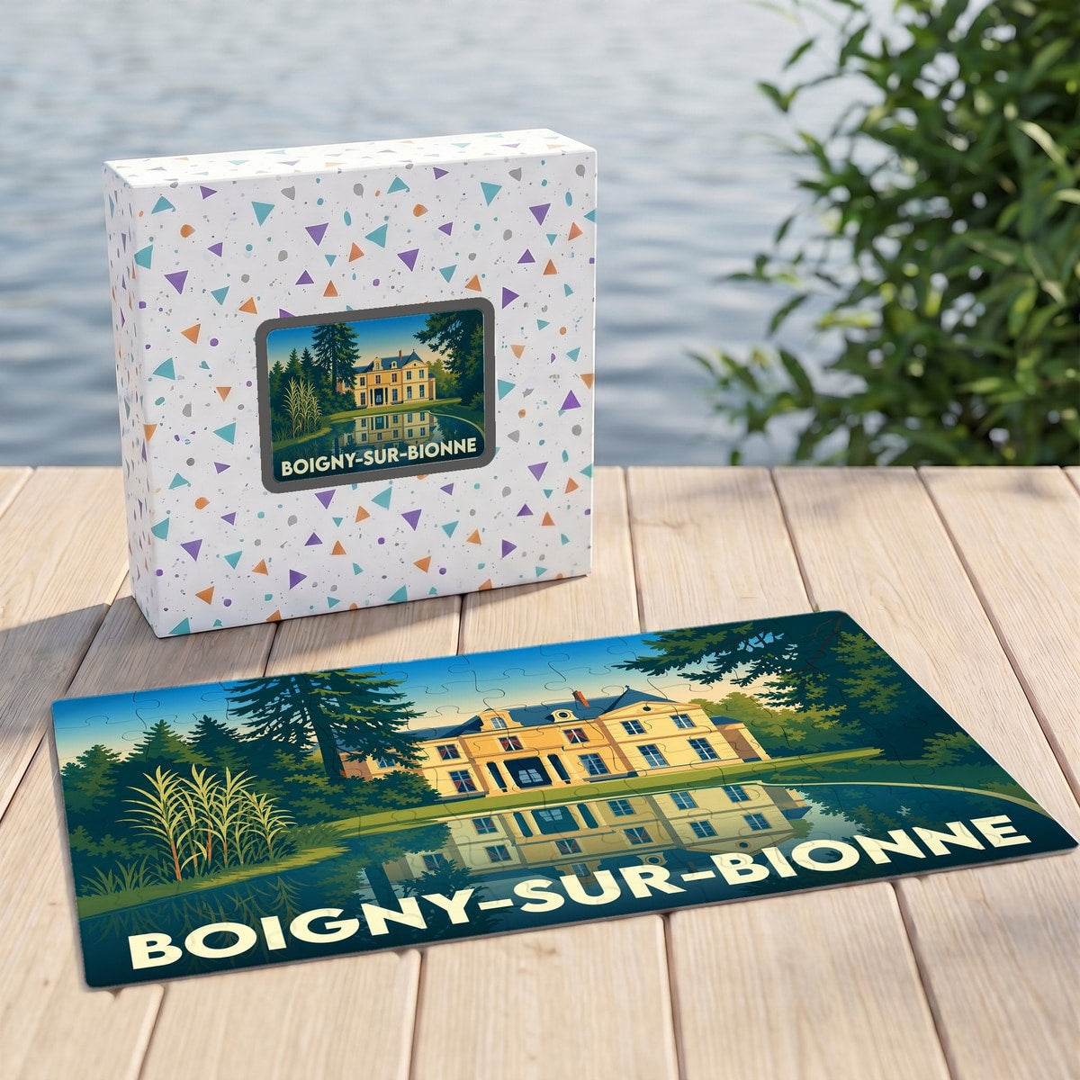 Puzzle souvenir de la ville de Boigny-sur-Bionne avec une illustration stylisée d'un château se reflétant dans l'eau.