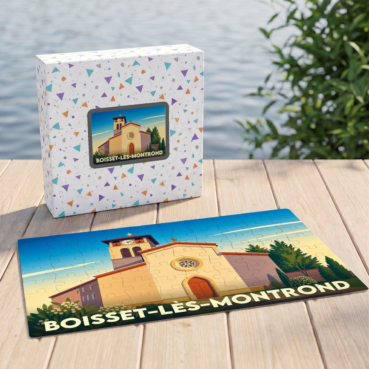 Puzzle souvenir de la ville de Boisset-lès-Montrond avec une illustration stylisée d'une église.