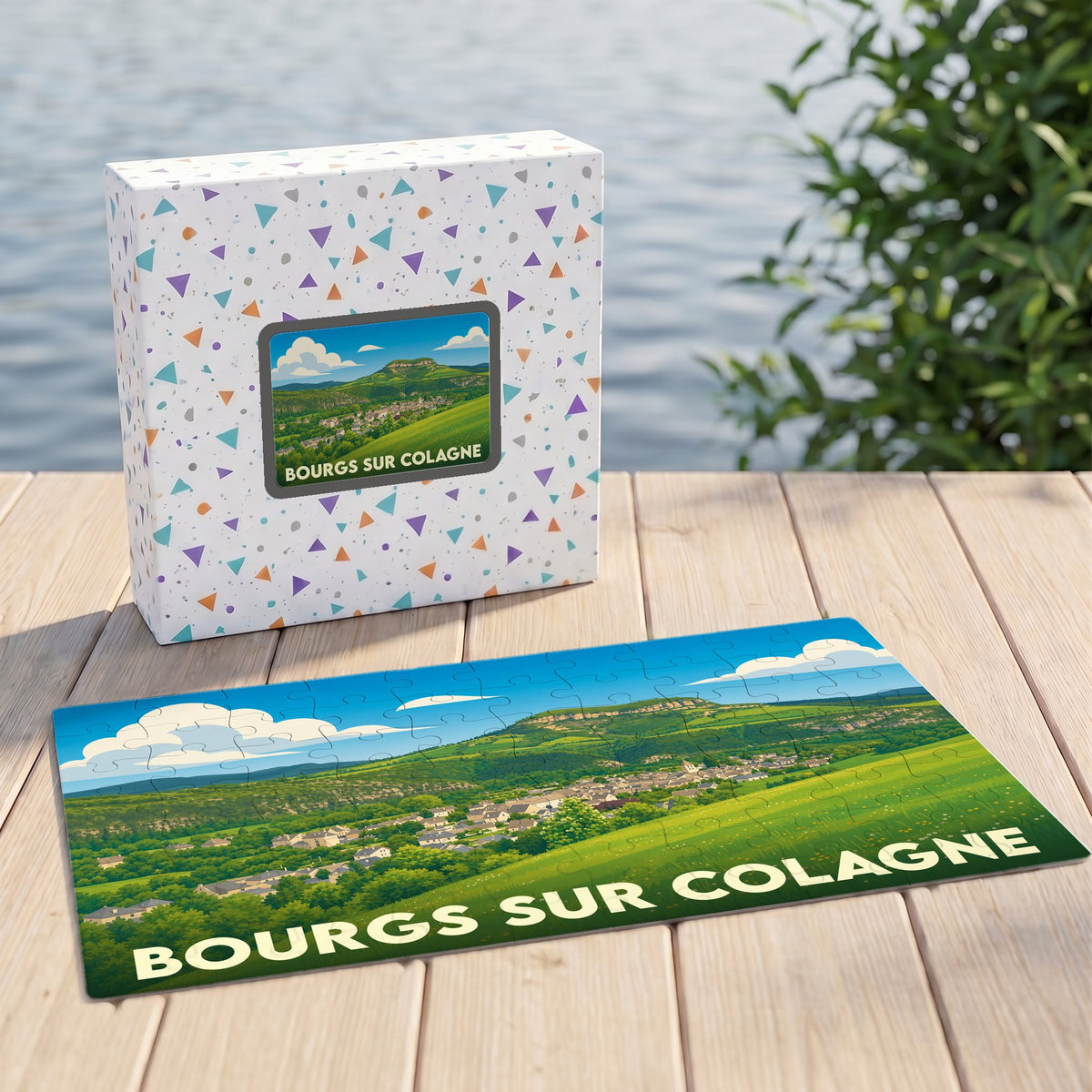 Puzzle souvenir de la ville de Bourgs sur Colagne avec une illustration de paysage champêtre.