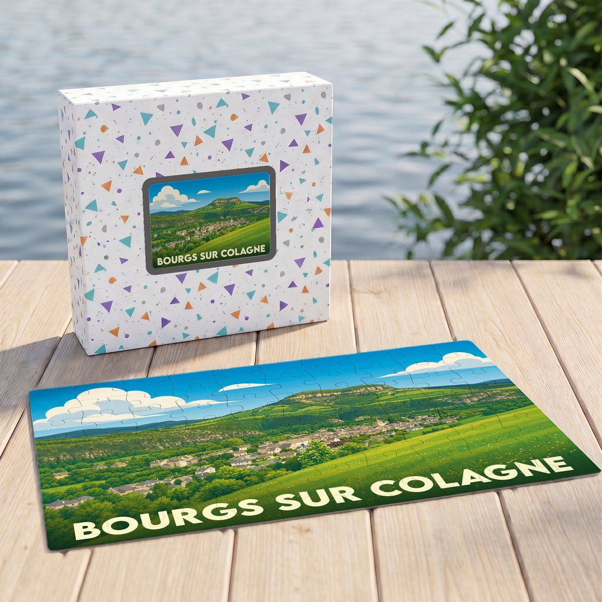 Puzzle souvenir de la ville de Bourgs sur Colagne avec une illustration de paysage champêtre.