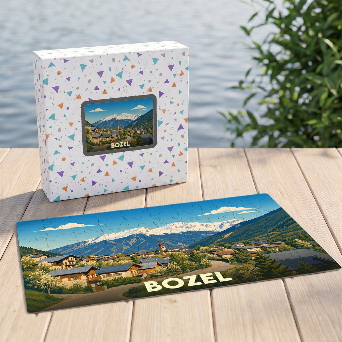 Puzzle souvenir de la ville de Bozel avec une illustration stylisée de ses montagnes et habitations.