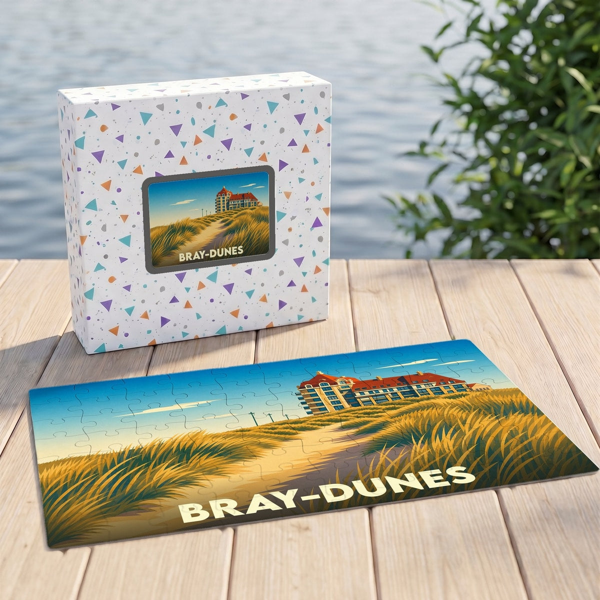 Puzzle souvenir de la ville de Bray-Dunes illustrant un bâtiment de bord de mer dans les dunes.