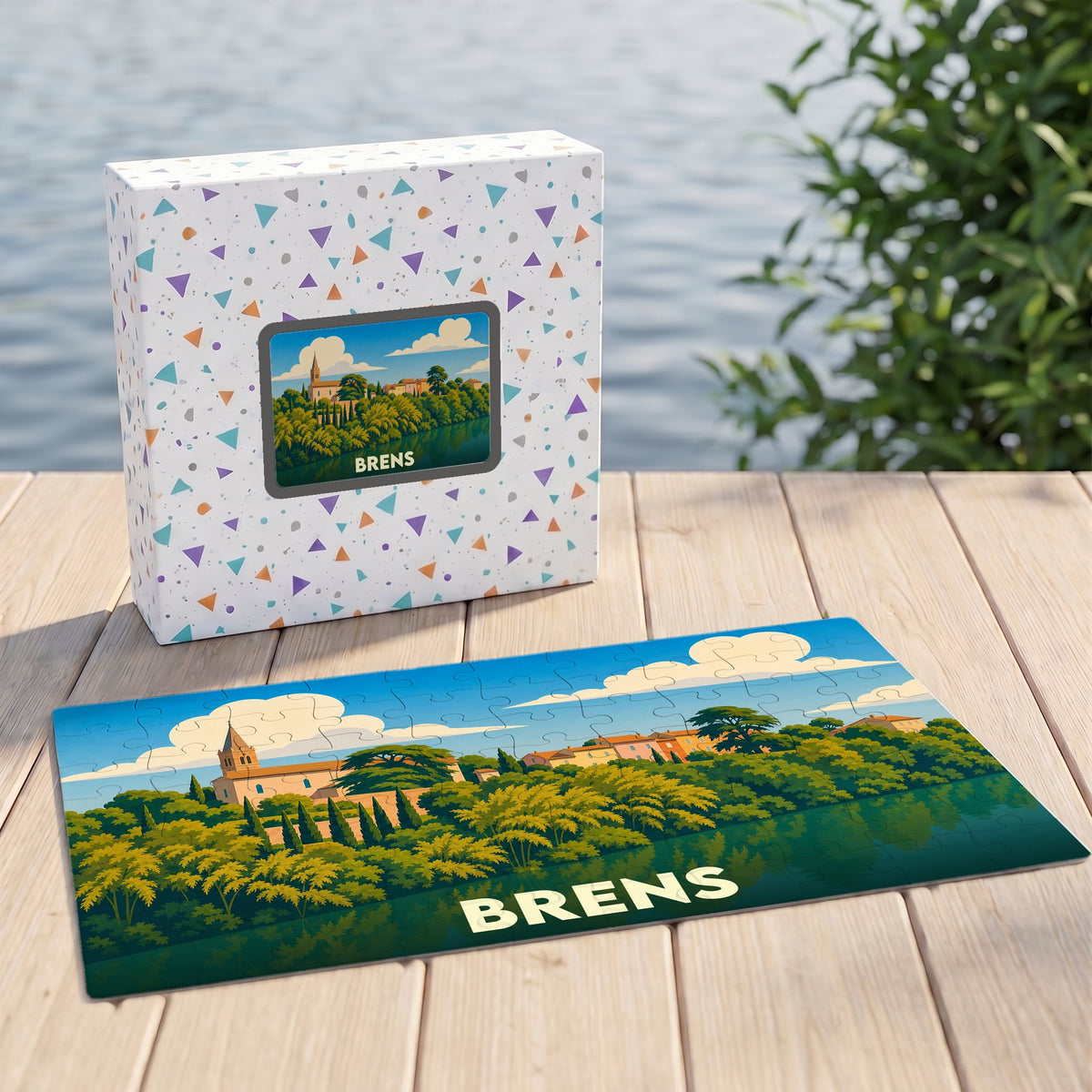 Puzzle souvenir de la ville de Brens avec une illustration stylisée de son paysage au bord de l'eau.