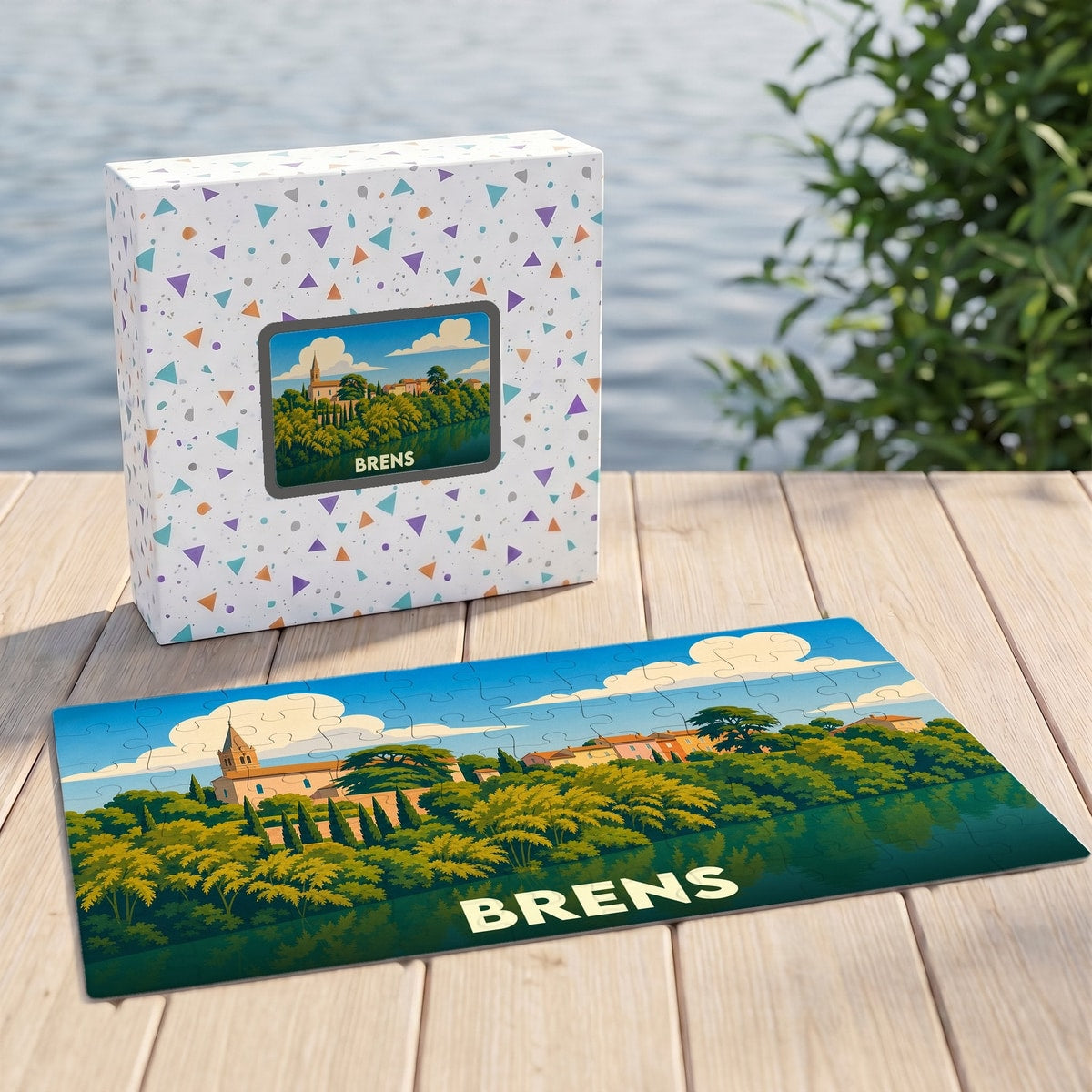 Puzzle souvenir de la ville de Brens avec une illustration stylisée de son paysage au bord de l'eau.