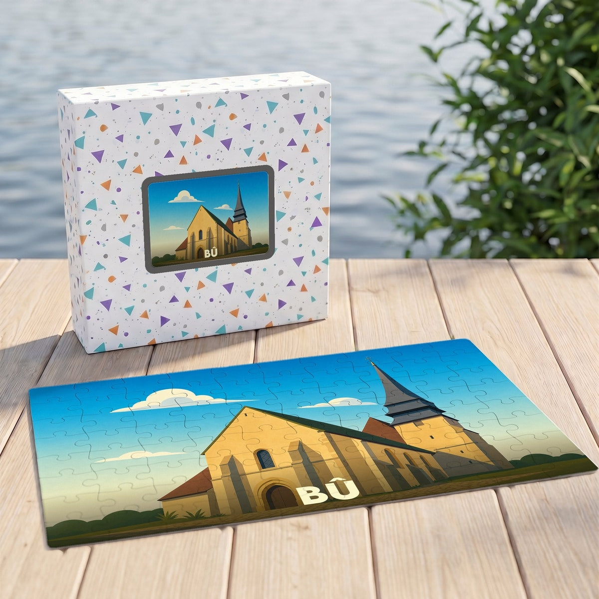 Puzzle souvenir de la ville de Bû avec une illustration stylisée de son église.