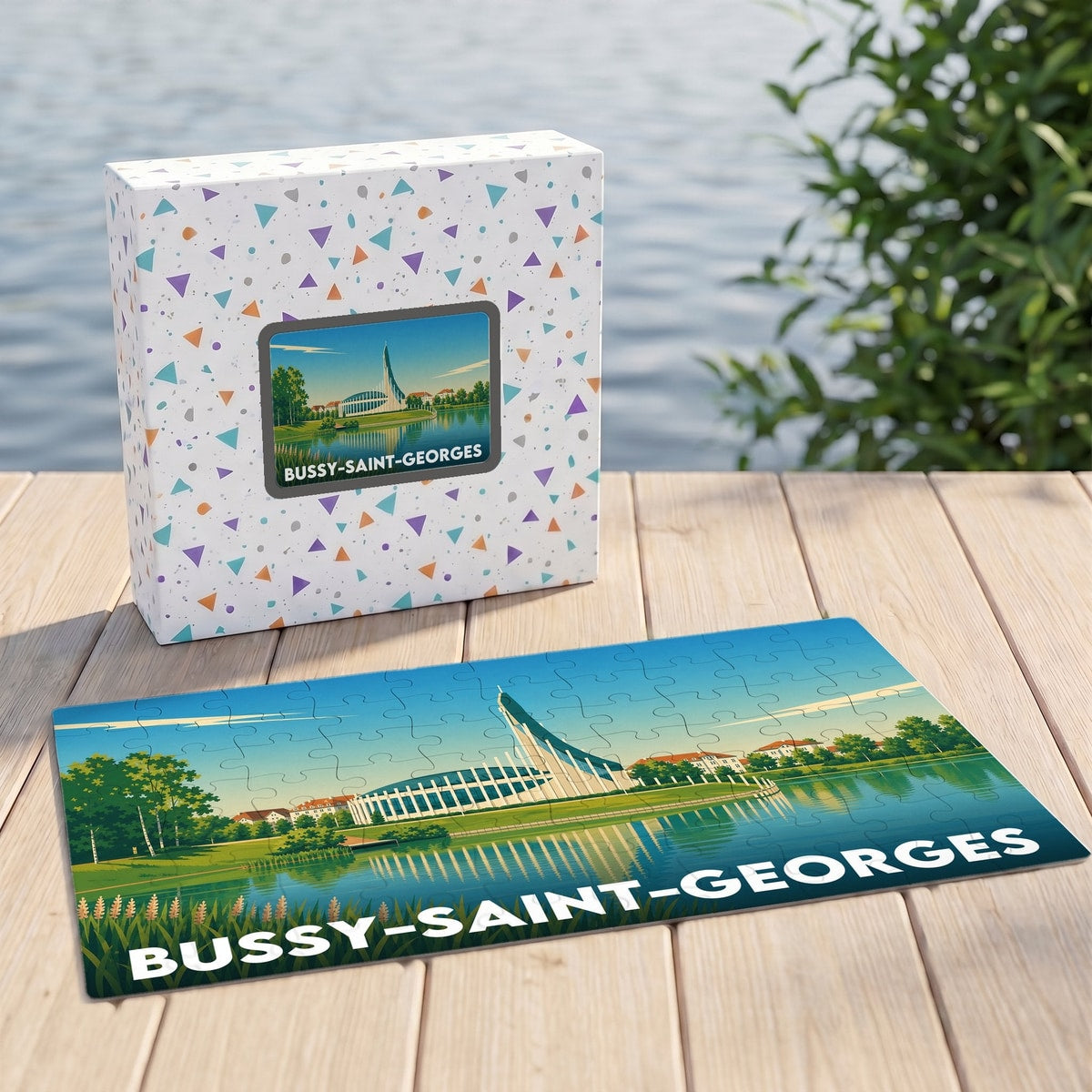 Puzzle souvenir de la ville de Bussy-Saint-Georges illustré par un paysage lacustre stylisé.