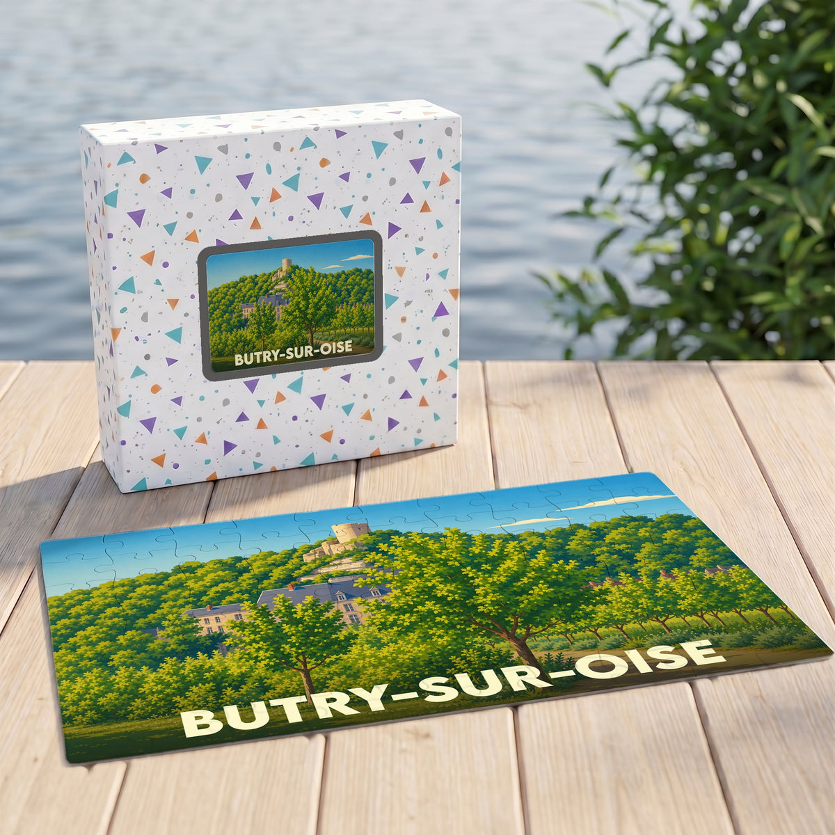Puzzle souvenir de la ville de Butry-sur-Oise avec une illustration stylisée d'un paysage verdoyant et son château.