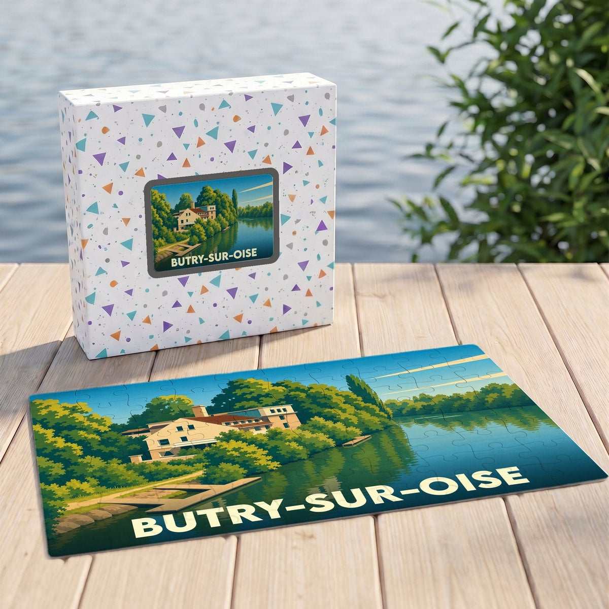 Puzzle souvenir de la ville de Butry-sur-Oise avec une illustration stylisée d'une demeure au bord de l'eau.
