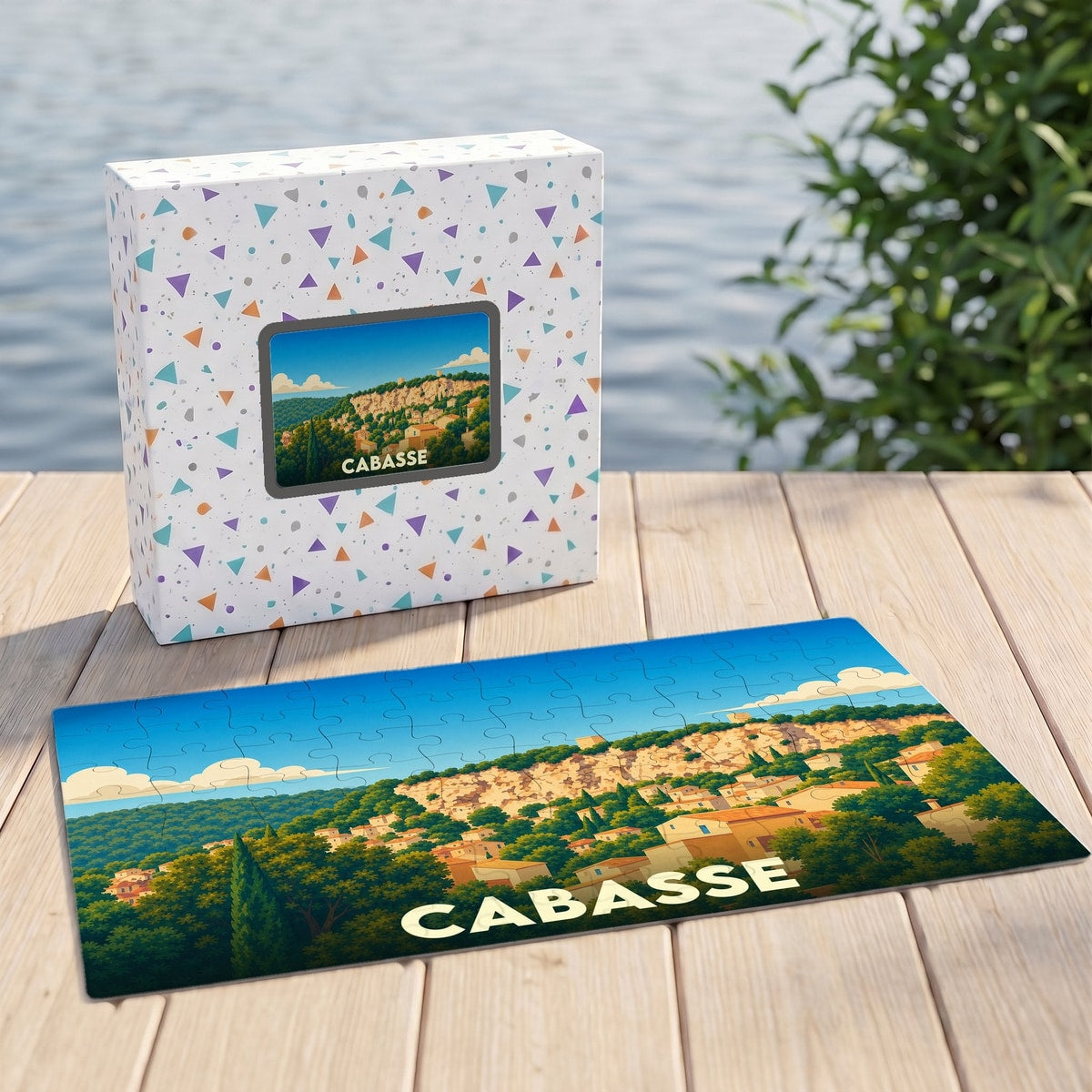 Puzzle souvenir de la ville de Cabasse avec une illustration stylisée d'un paysage provençal.