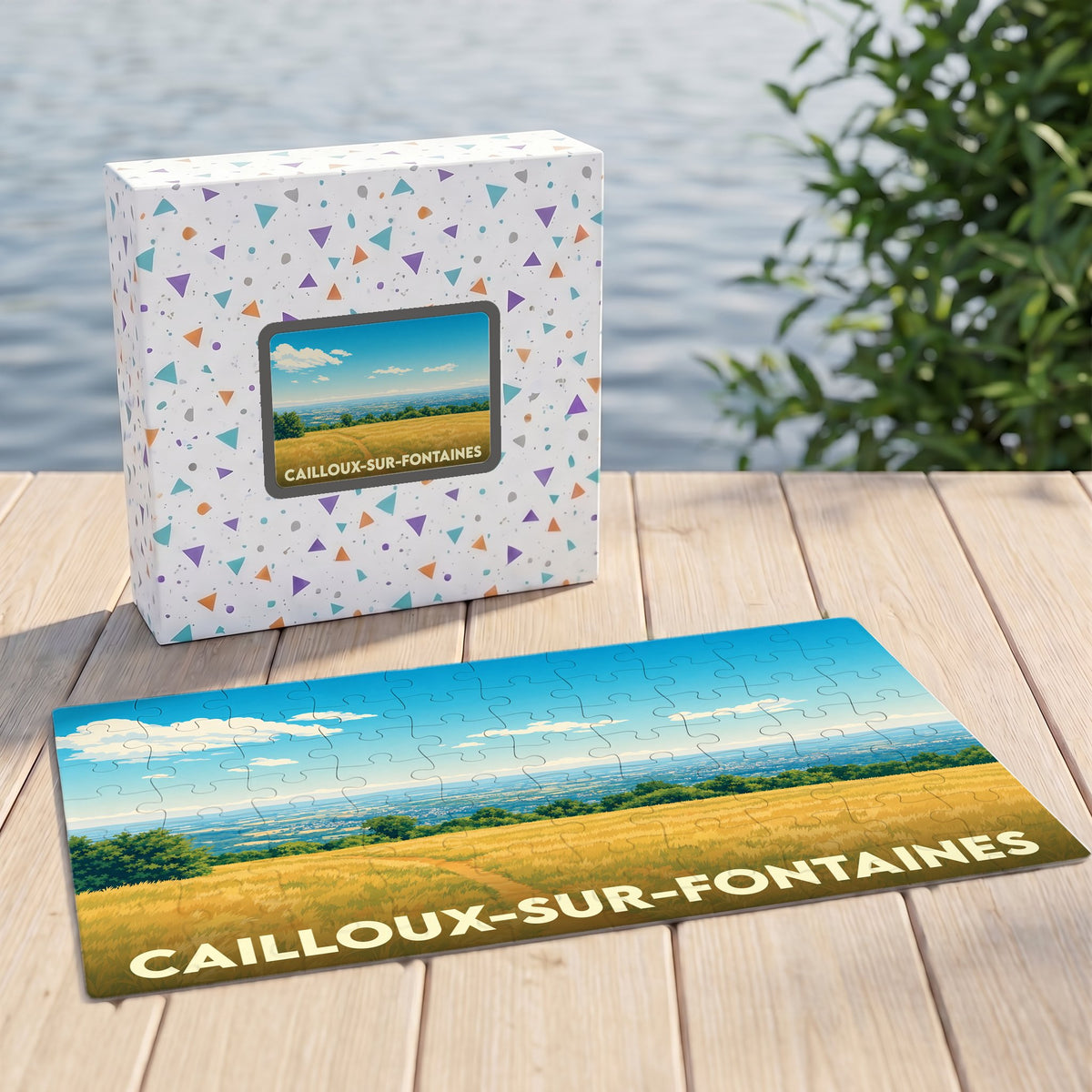 Puzzle souvenir de la ville de Cailloux-sur-Fontaines illustrant un paysage champêtre panoramique.