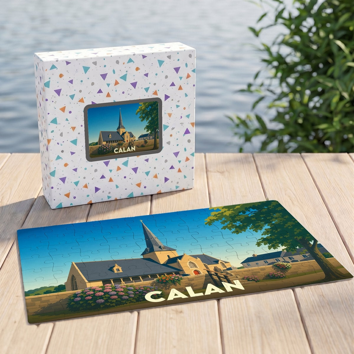 Puzzle souvenir de la ville de Calan avec une illustration stylisée de son église.