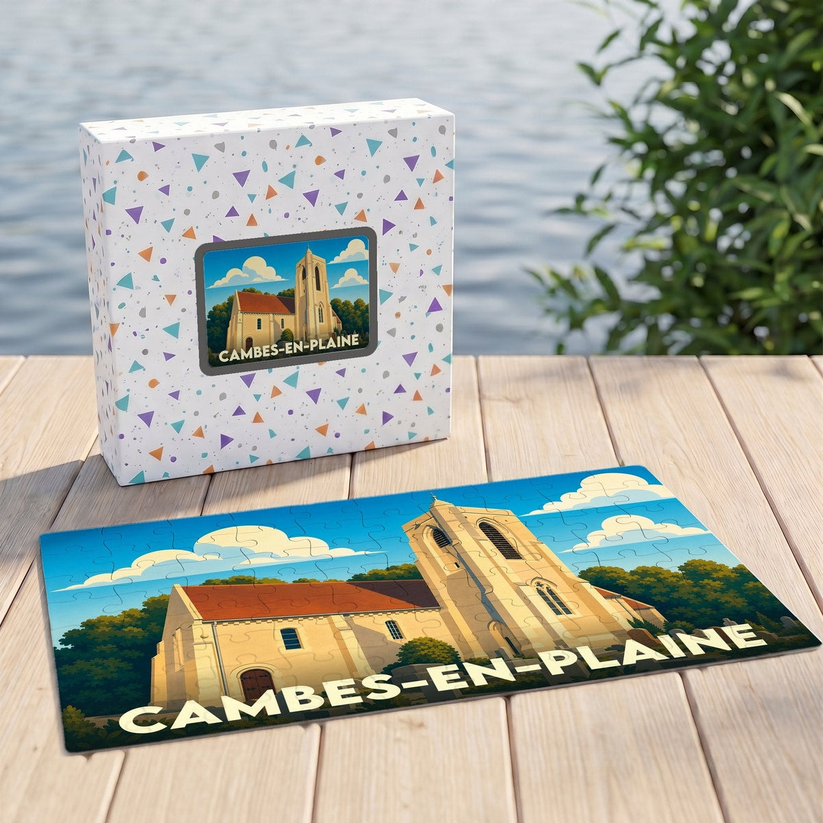 Puzzle souvenir de la ville de Cambes-en-Plaine avec une illustration stylisée de son église.