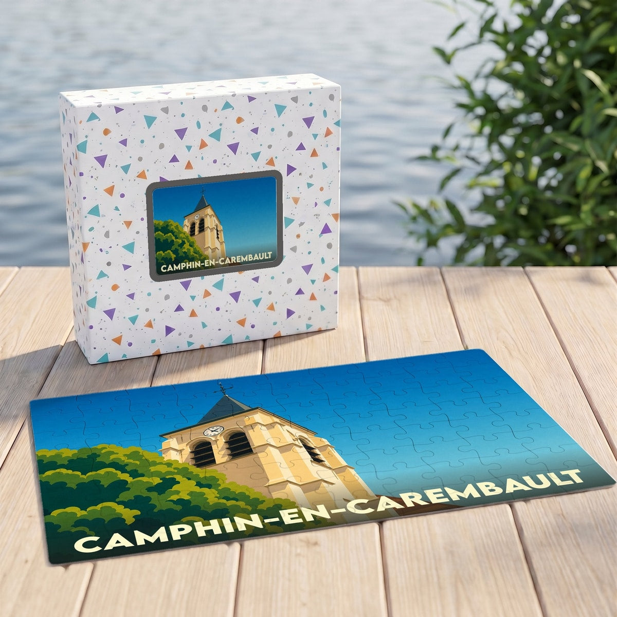 Puzzle souvenir de la ville de Camphin-en-Carembault avec une illustration stylisée de son église et de son clocher.