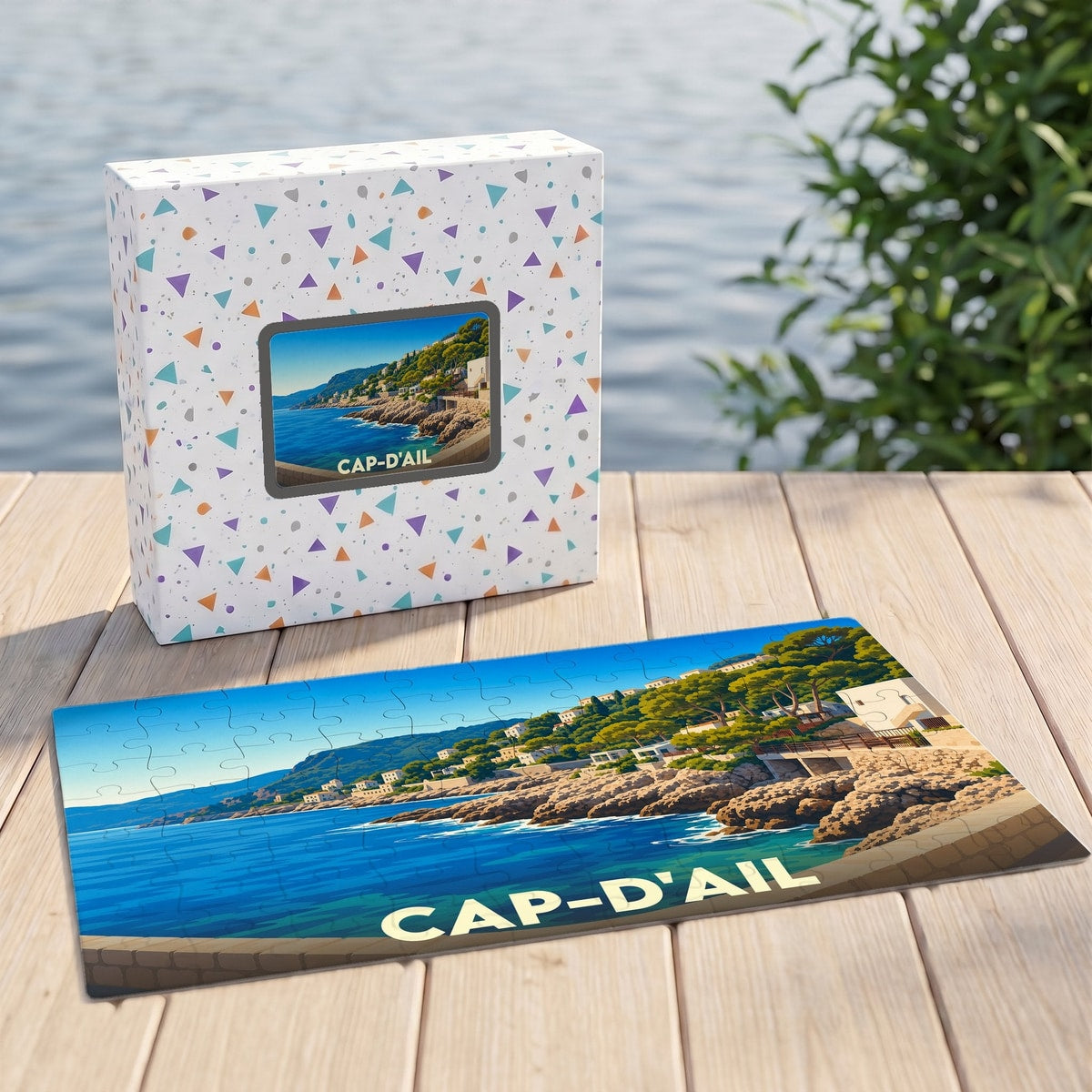 Puzzle souvenir de la ville de Cap-d'Ail avec une illustration de son littoral escarpé.