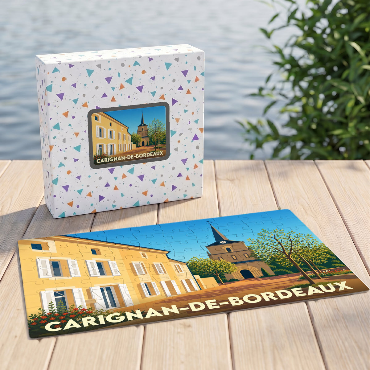 Puzzle souvenir de la ville de Carignan-de-Bordeaux avec une illustration stylisée et colorée.