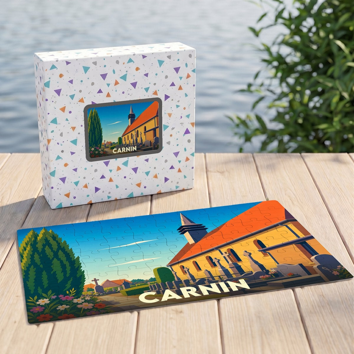 Puzzle souvenir de la ville de Carnin avec une illustration stylisée de son église et de son cimetière.