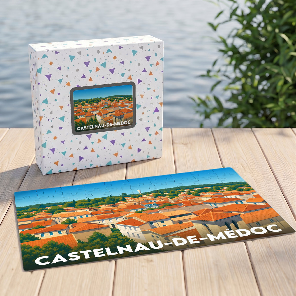 Puzzle souvenir de la ville de Castelnau-de-Médoc avec une illustration stylisée de ses toits.