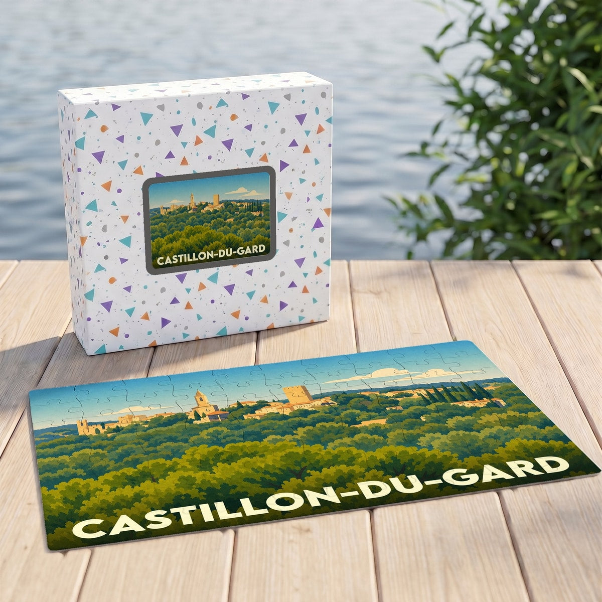 Puzzle souvenir de la ville de Castillon-du-Gard avec une illustration stylisée de son panorama.