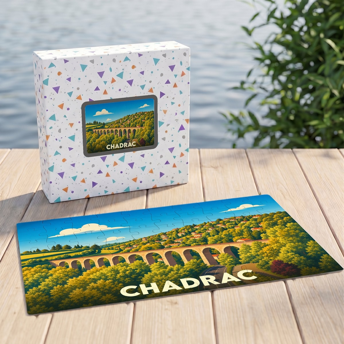 Puzzle souvenir de la ville de Chadrac illustré d'un viaduc dans un paysage verdoyant.