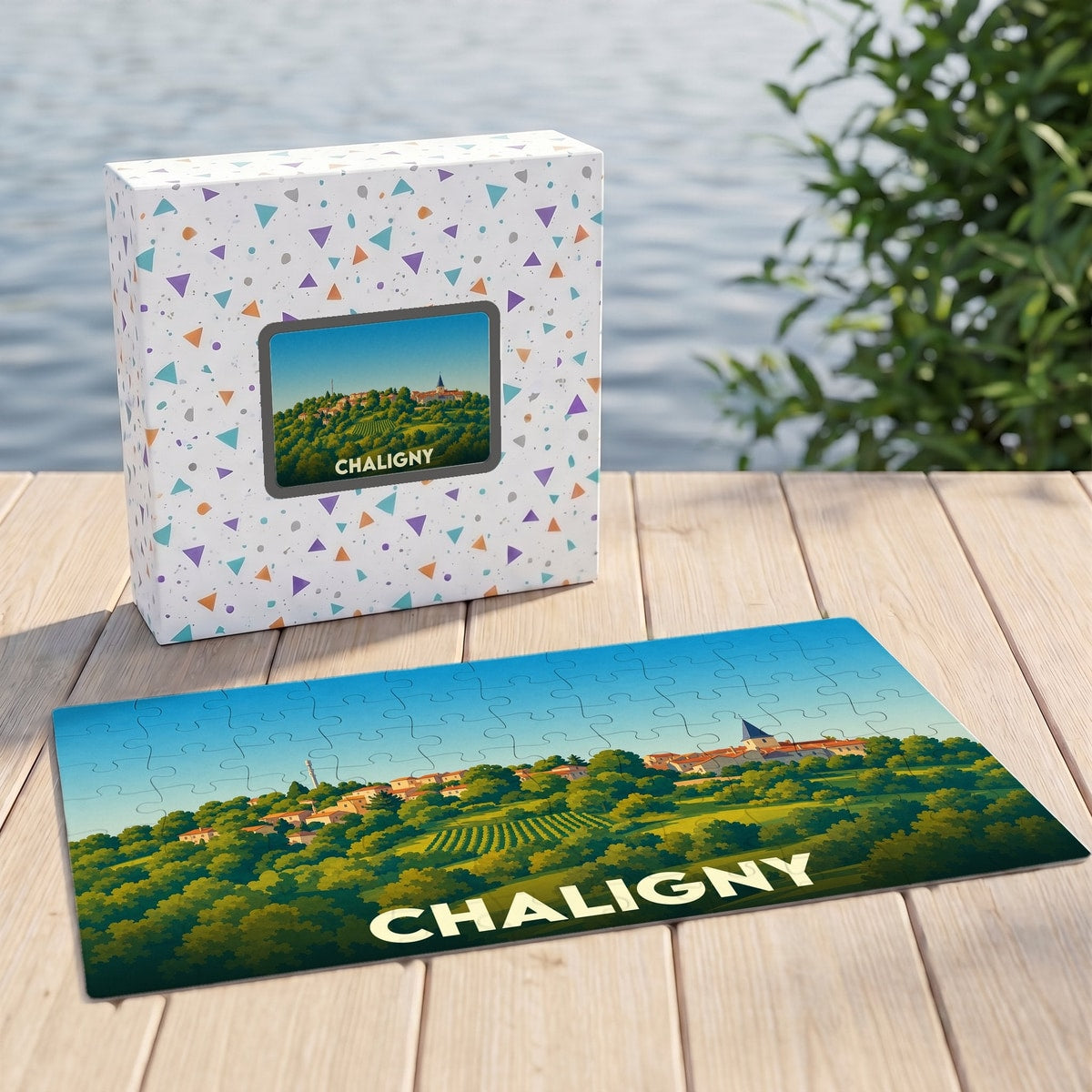 Puzzle souvenir de la ville de Chaligny avec une illustration de son paysage urbain entouré de verdure.