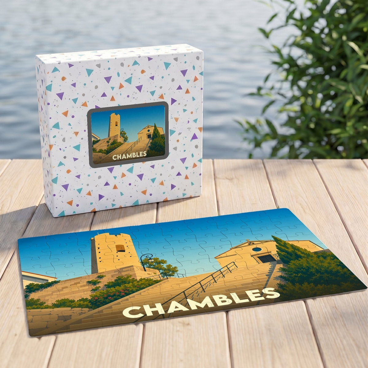Puzzle souvenir de la ville de Chambles avec une illustration stylisée de son patrimoine.