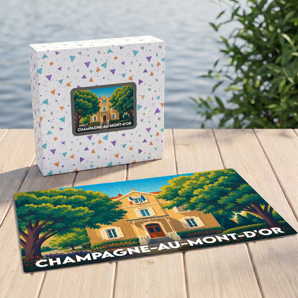 Puzzle souvenir de la ville de Champagne-au-Mont-d'Or avec son boîtier et une illustration stylisée.