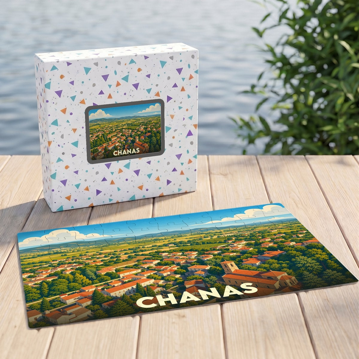 Puzzle souvenir de la ville de Chanas illustrant une vue aérienne stylisée du village et de ses environs.