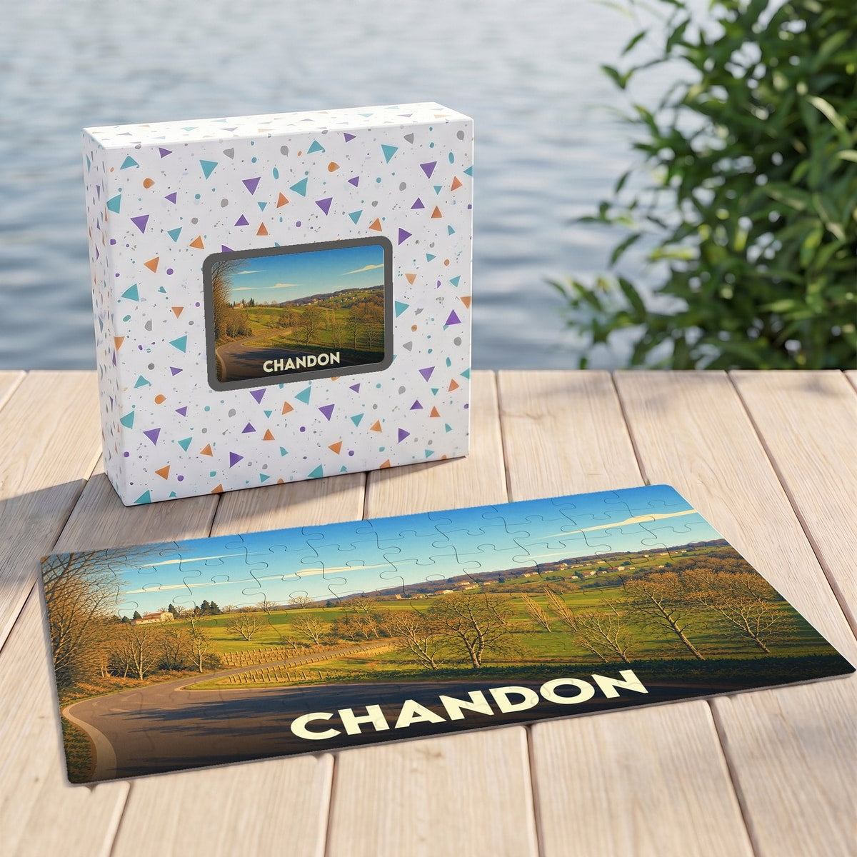 Puzzle souvenir de la ville de Chandon illustré d'un paysage rural ensoleillé.