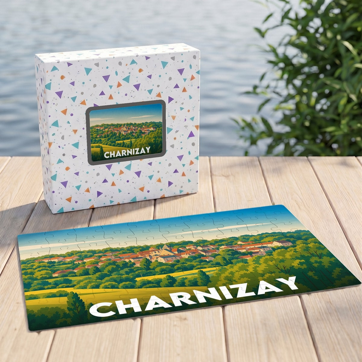 Puzzle souvenir de la ville de Charnizay avec une illustration paysagère stylisée.