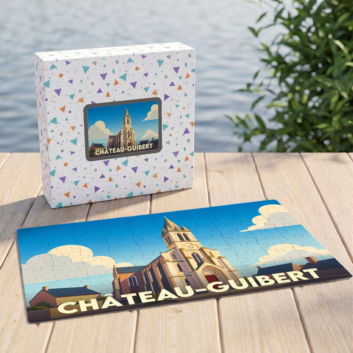 Puzzle souvenir de la ville de Château-Guibert avec une illustration stylisée d'une église.