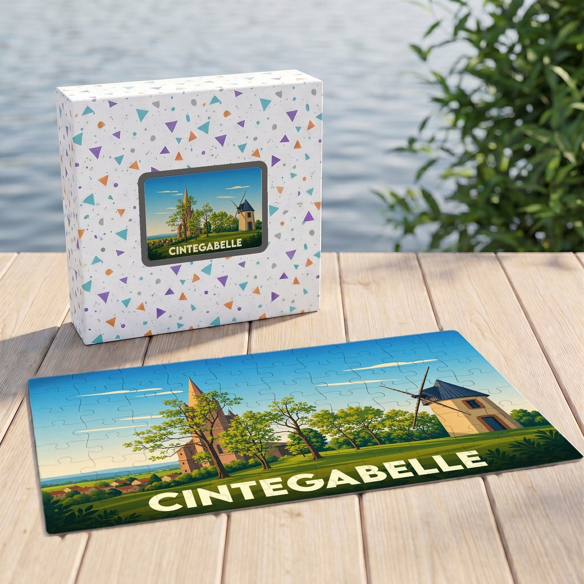 Puzzle souvenir de la ville de Cintegabelle avec une illustration stylisée d'un moulin et d'une église.