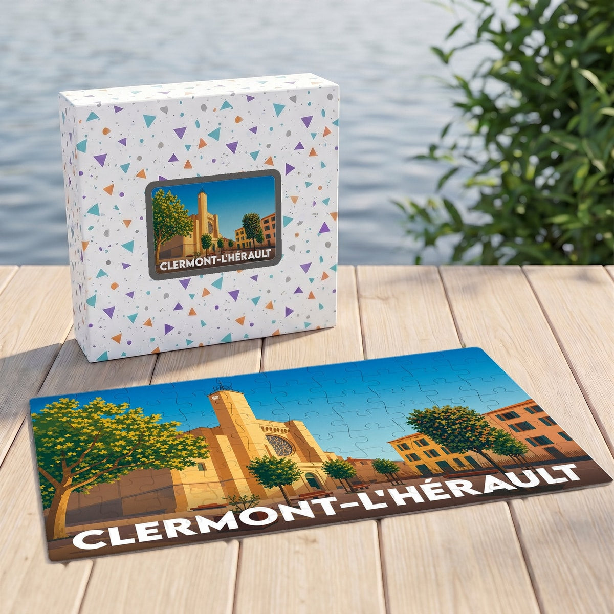 Puzzle souvenir de la ville de Clermont-l'Hérault avec une illustration stylisée de son église.