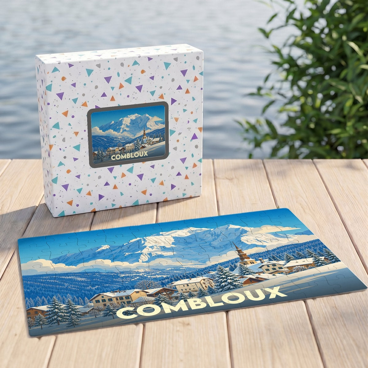 Puzzle souvenir de la ville de Combloux représentant un paysage de montagne enneigé avec une illustration stylisée.