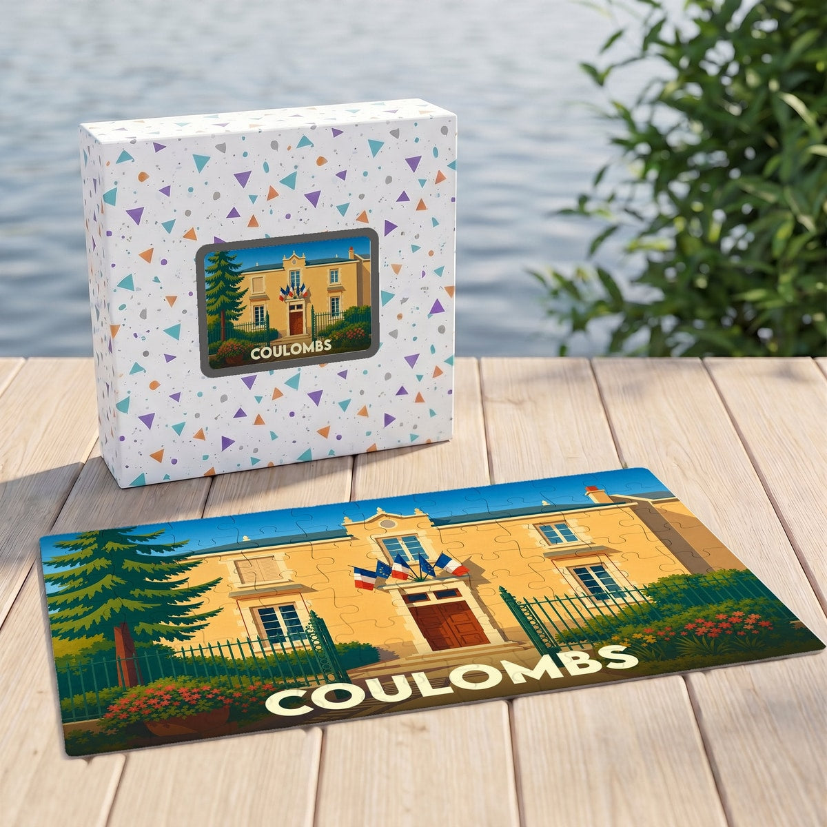 Puzzle souvenir de la ville de Coulombs représentant l'hôtel de ville avec une illustration colorée et stylisée.