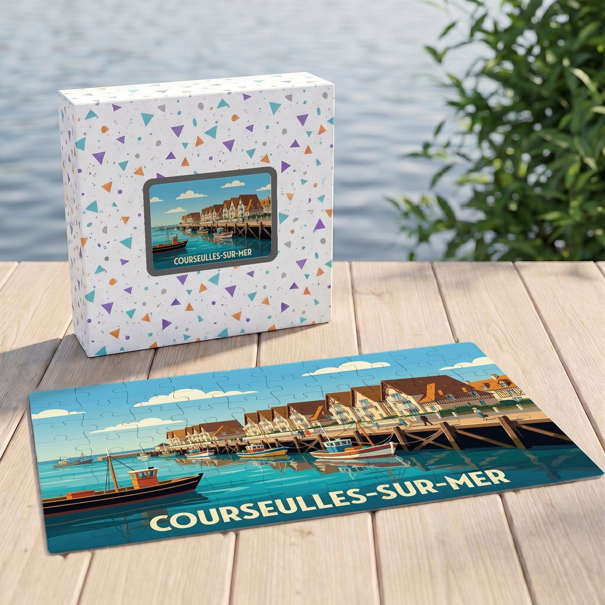 Puzzle souvenir de la ville de Courseulles-sur-Mer avec une illustration stylisée d'un port de pêche.