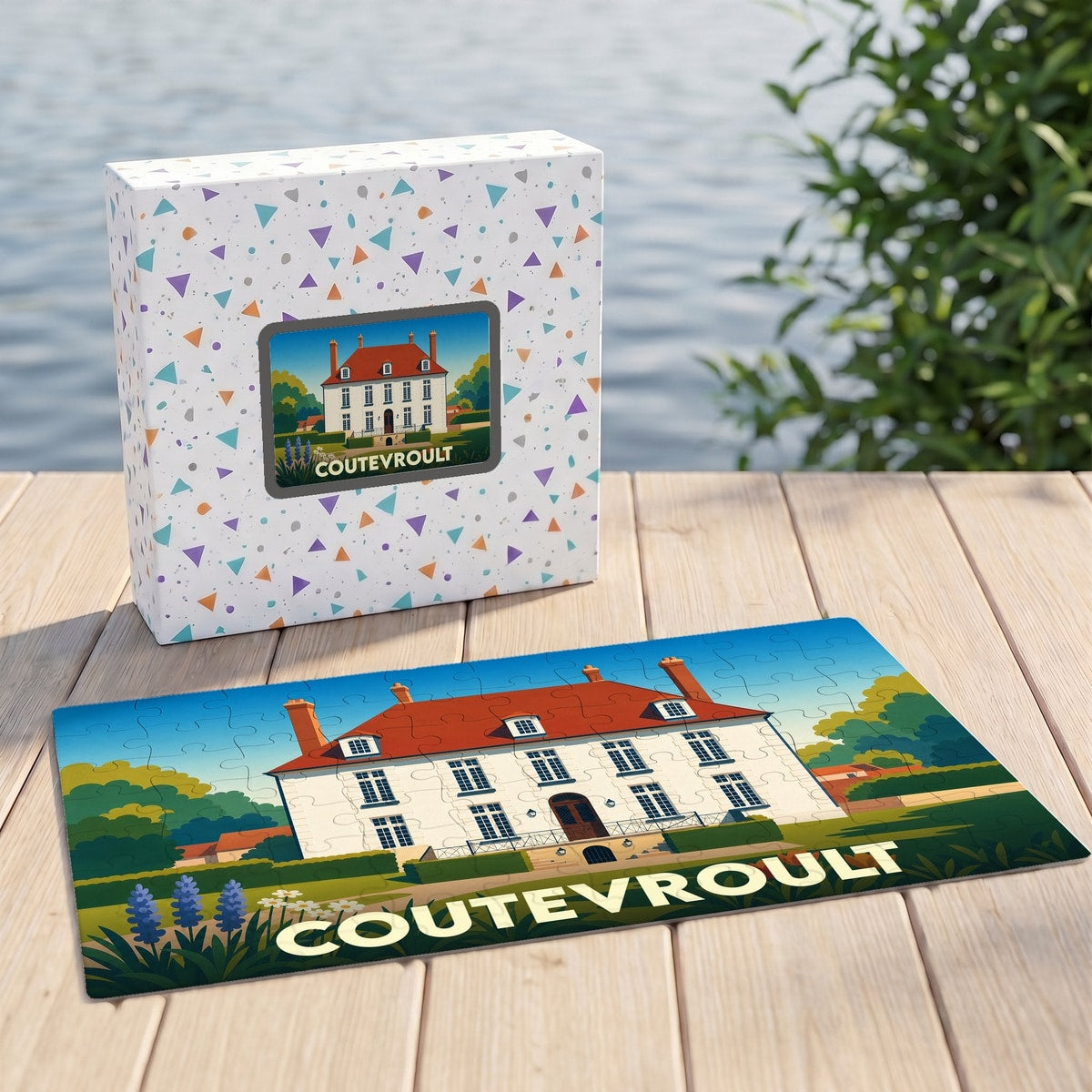 Puzzle souvenir de la ville de Coutevroult représentant une grande demeure illustrée dans un style graphique et coloré.