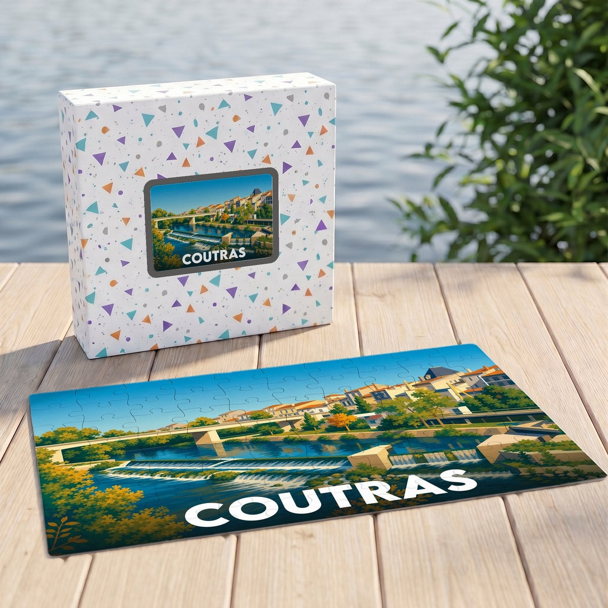 Puzzle souvenir de la ville de Coutras avec une illustration stylisée d'un paysage fluvial.