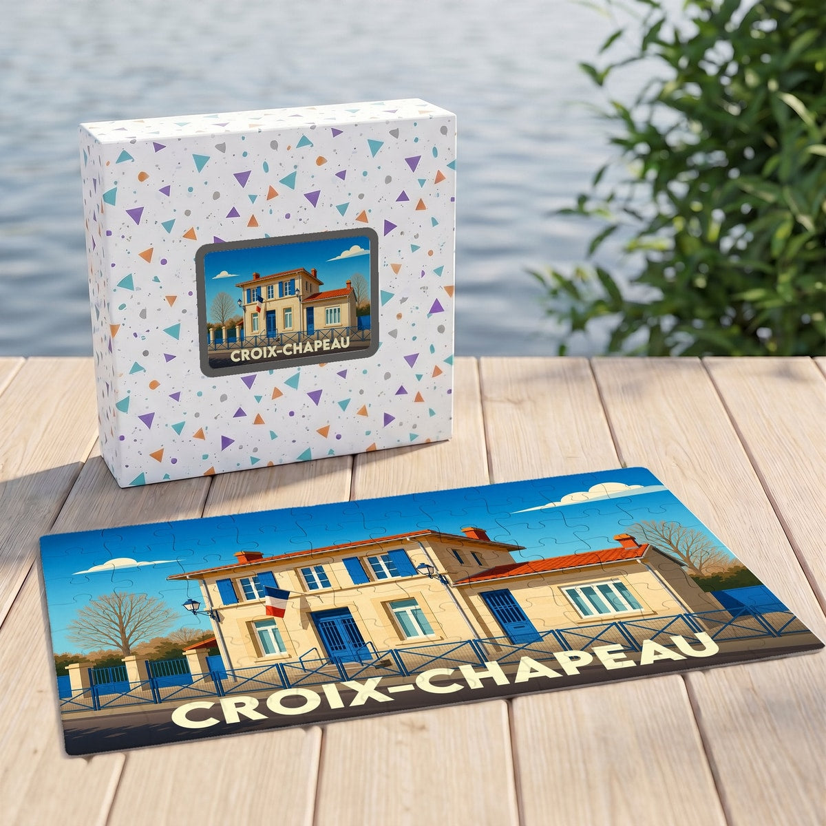 Puzzle souvenir de la ville de Croix-Chapeau avec une illustration stylisée de sa mairie.