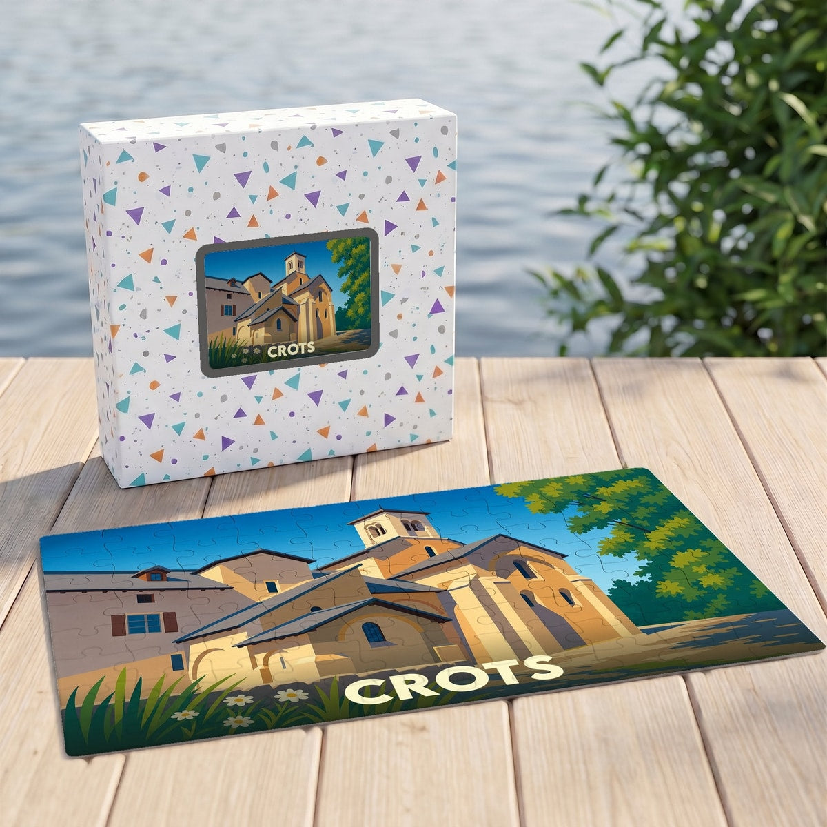 Puzzle souvenir de la ville de Crots avec une illustration stylisée de son patrimoine architectural.