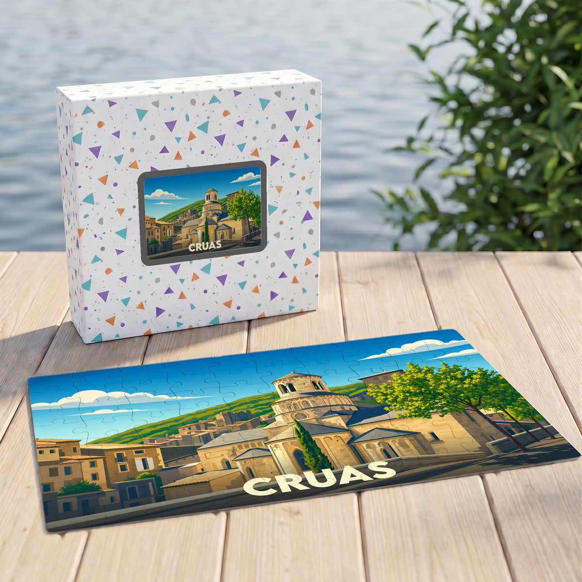 Puzzle souvenir de la ville de Cruas avec une illustration stylisée de son patrimoine architectural.
