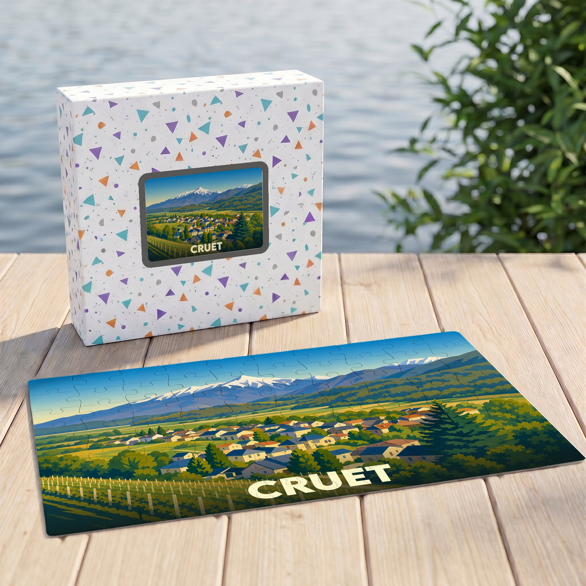 Puzzle souvenir de la ville de Cruet illustrant un paysage de montagnes et de vignobles.