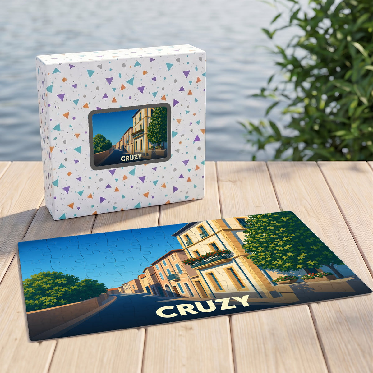 Puzzle souvenir de la ville de Cruzy avec une illustration stylisée d'une rue ensoleillée.