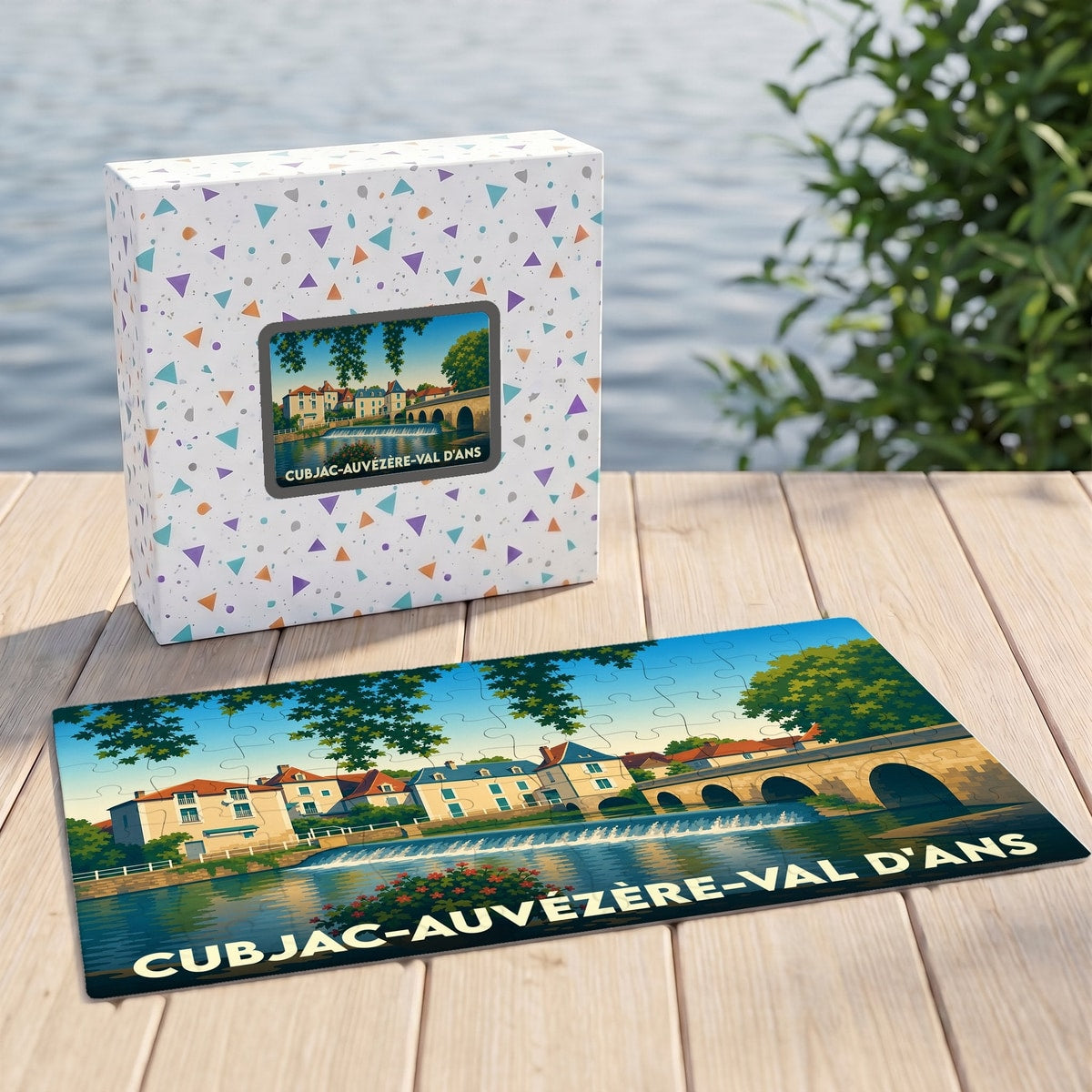 Puzzle souvenir de Cubjac-Auvézère-Val d'Ans avec une illustration stylisée de son pont et de ses quais.