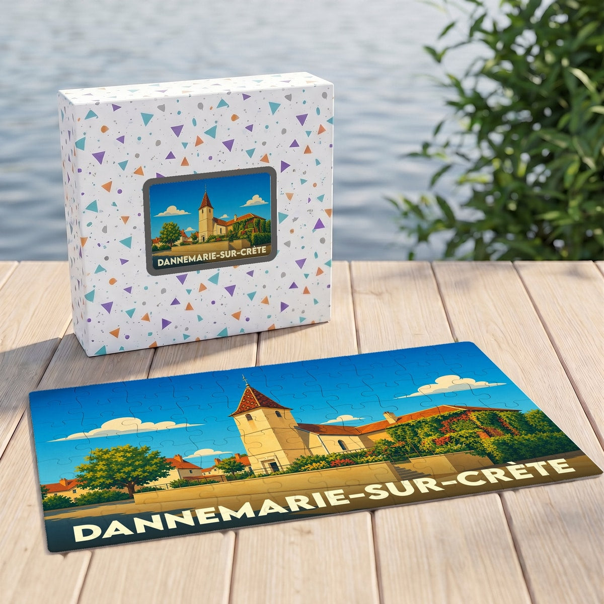 Puzzle souvenir de la ville de Dannemarie-sur-Crète avec son illustration stylisée et sa boîte assortie.