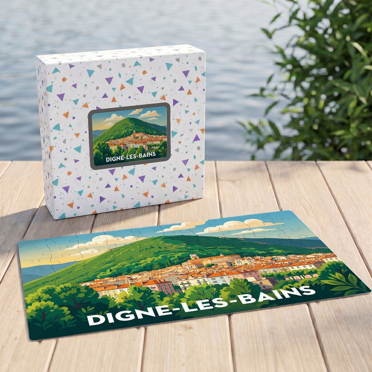 Puzzle souvenir de la ville de Digne-les-Bains avec une illustration stylisée de son paysage urbain et montagneux.