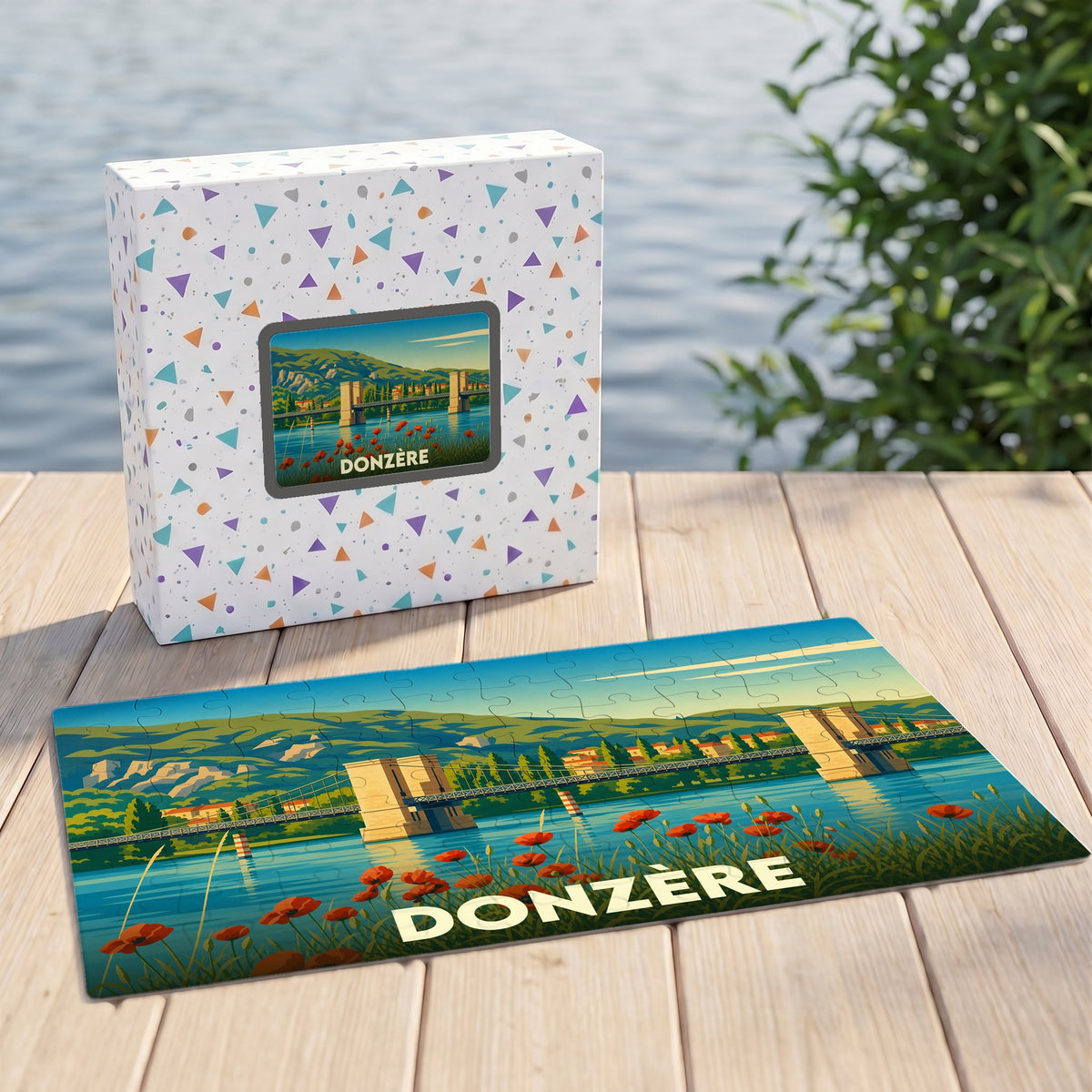 Puzzle souvenir de la ville de Donzère avec une illustration stylisée de son célèbre pont suspendu.