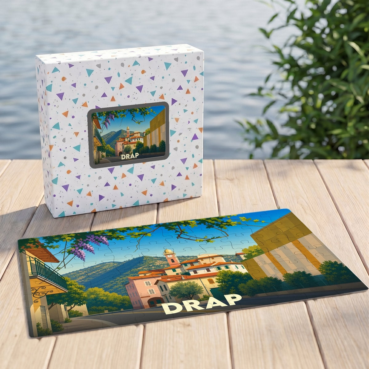 Puzzle souvenir de la ville de Drap avec une illustration stylisée et colorée.